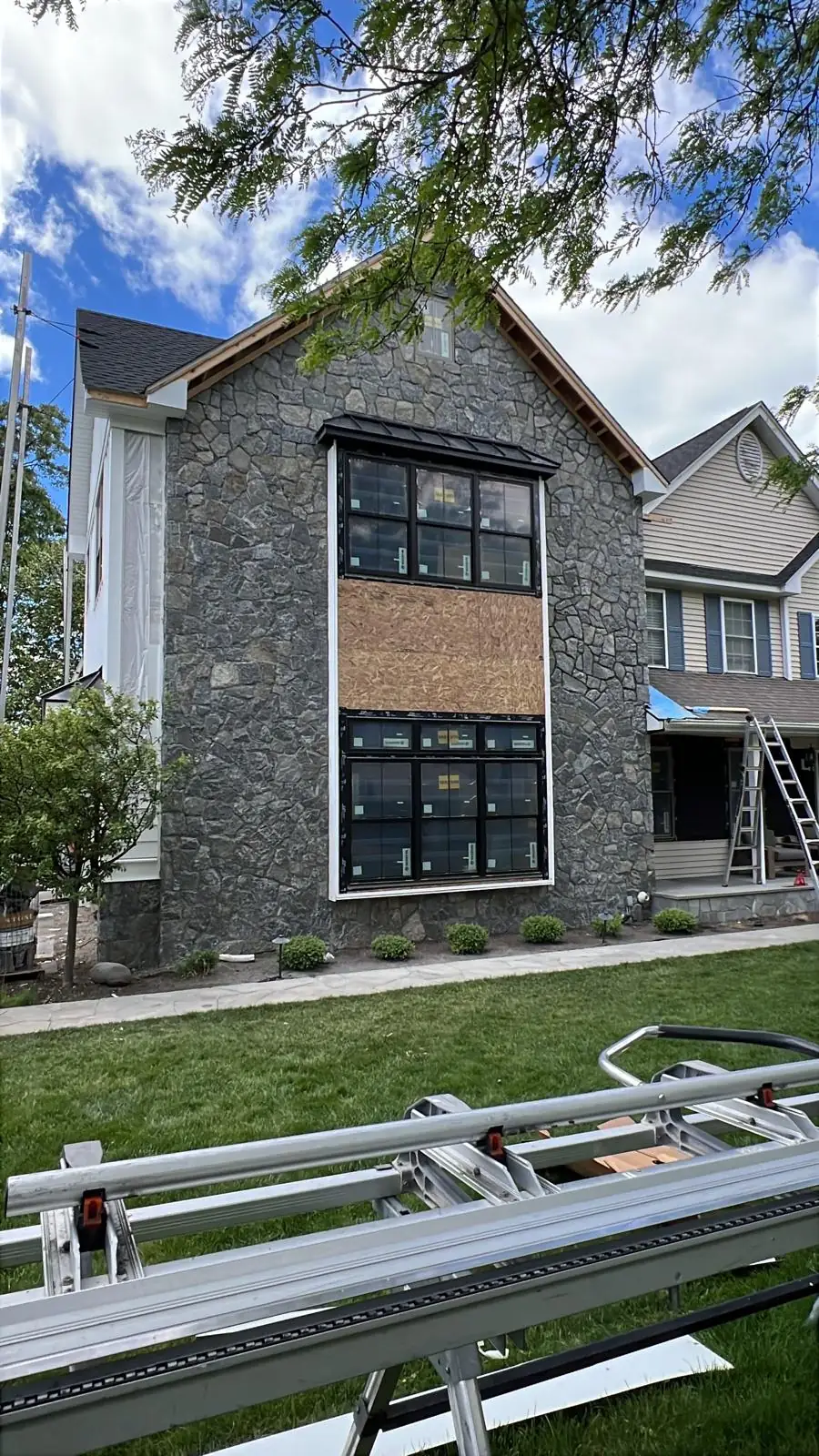 Stone facade on a residential construction project in progress
